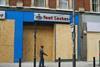 boarded up shops