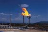 Oil refinery with burning flame