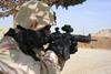soldier aiming a rifle