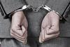 Businessman jail handcuffs fraud