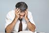 Stressed distraught worried businessman