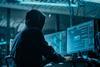 hacker in control room