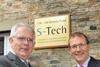 Martin Taylor (l) shakes hands wiht S-Tech Director Des Matthewson