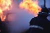 firefighter tackling a blaze