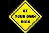 at your own risk sign