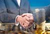 money investment shake hands