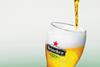 glass of Heineken lager