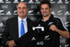 Peter Hancock, chief executive of AIG Property Casualty, and Richie McCaw, captain of the All Blacks, with new AIG All Blacks jersey.