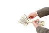 dollars being counted