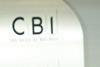 Richard Lambert of the CBI with CBI logo behind him