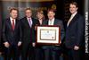 Sandy Scott, CEO CII, presents the Chartered Insurer status to Steve Lewis, CEO, UK General Insurance, Zurich, Tony Emms (Chief Claims Officer, Zurich UK) and Jo Smith (Head of Technical Learning and Development, Zurich UKGI). Steve Jenkins, CII Director