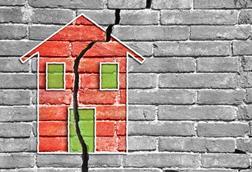 cracked brick house wall