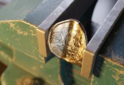 squeezed costs pound in a vice