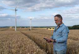 1. Farmer with Mobile phone - GettyImages