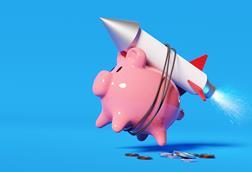 investment soar piggy bank rocket