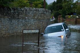 Flooding car road