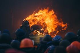 civil unrest riot burning car violence