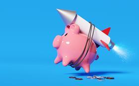 investment soar piggy bank rocket