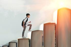 child climbing books