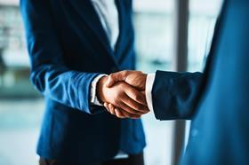 handshake men in suits