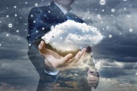 business man holding cloud