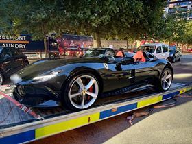 Ferrari_Monza_being_taken_to_pound_jpg