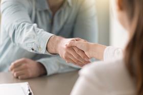 woman shaking hands