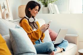 girl laptop sofa phone gadget