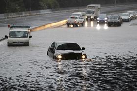 vehicles-stranded-by-floods-in-auckland-new-zealand-AP-scaled