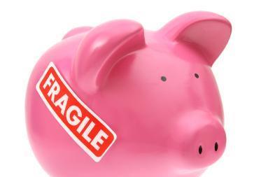 toy pig with the word Fragile stamped on it.