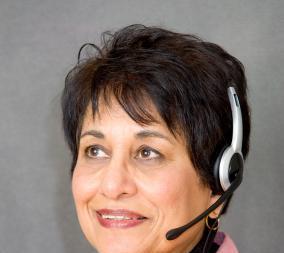 Indian woman with telephone headset