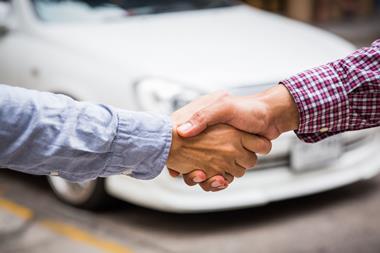 partnership car handshake