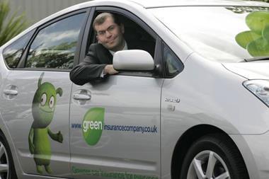man in Green Insurance car