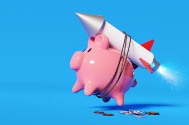 investment soar piggy bank rocket