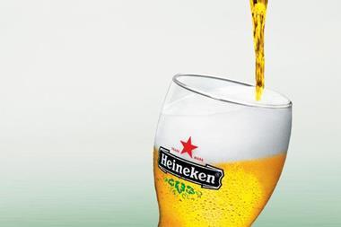 glass of Heineken lager