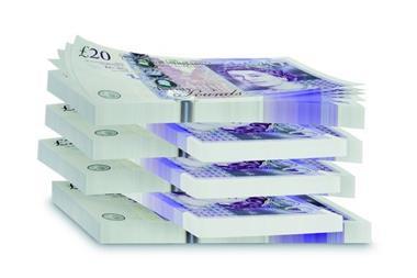 piles of Â£20 notes in bundles