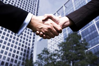 business men london handshake