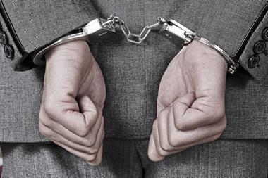 Businessman jail handcuffs fraud