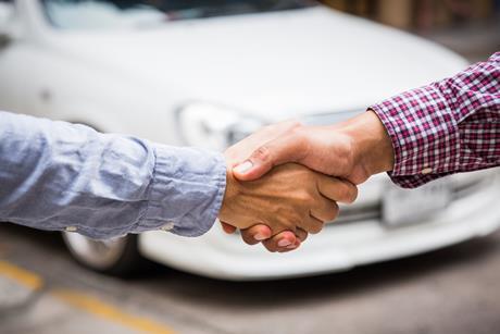 partnership car handshake