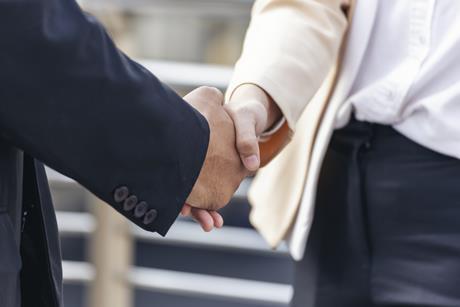 handshake white jacket