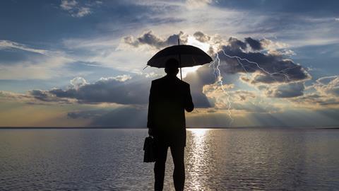 storm umbrella businessman