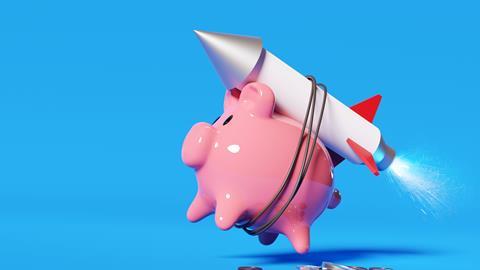 investment soar piggy bank rocket