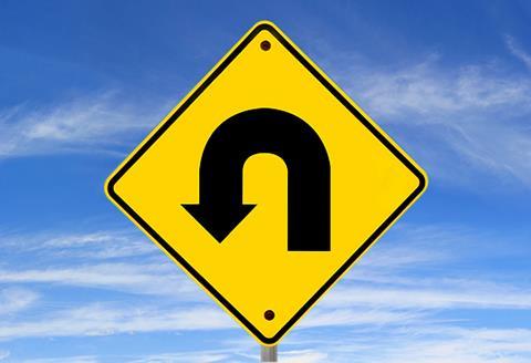 U-turn road sign