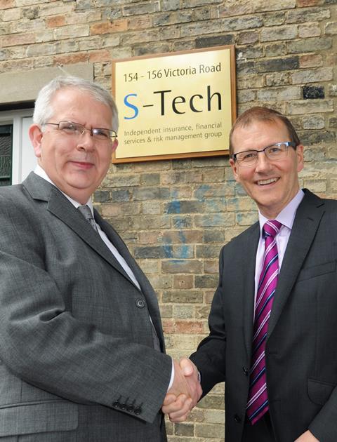 Martin Taylor (l) shakes hands wiht S-Tech Director Des Matthewson
