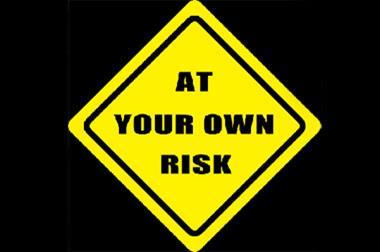 at your own risk sign